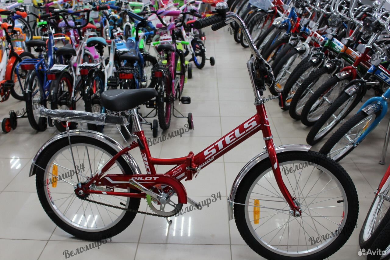 Авито волгоград велосипеды. Велосипед stels Pilot 310 красный. Велосипед стелс 310 складной красный. Велосипед стелс пилот 310 белый с красным. Велосипед красно оранжевый со скоростями мужской 2021 года.