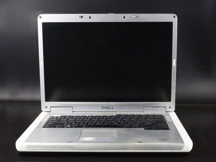 Ноутбук серебристый Dell Inspiron 1501