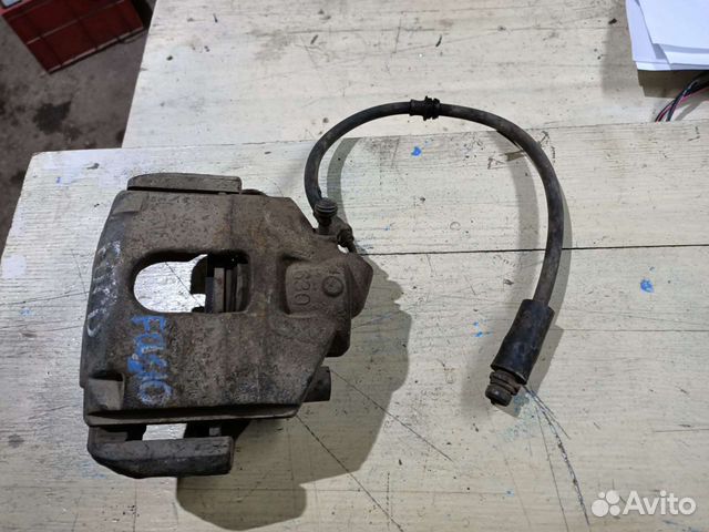 Суппорт тормозной передний правый Ford Fusion