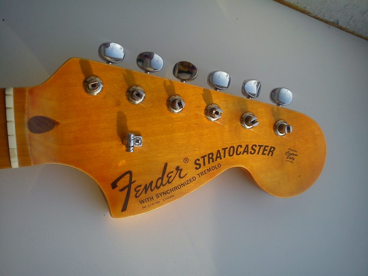 I need help identifying a replacement neck Fender Stratocaster Guitar