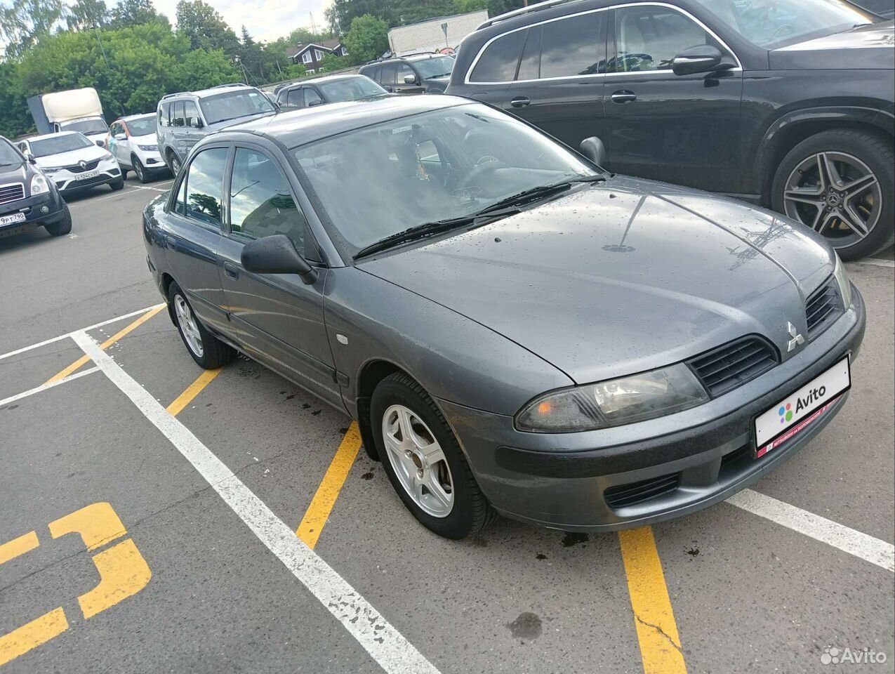 Mitsubishi carisma 2002 год. Митсубиси Каризма 2002. Мицубиси Каризма 2002. Мицубиси Каризма 2002 фото.