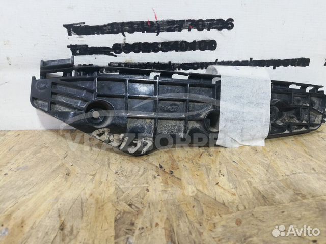 Кронштейн бампера переднего левый Toyota Land Crui