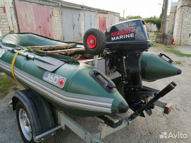 Лодка с мотором и прицепом