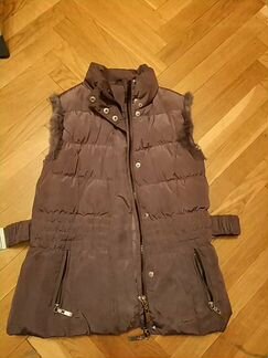 Тёплый жилет на девочку фиолетового цвета