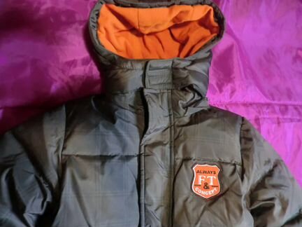 Новая пуховая куртка Футурино корич. клетка с оран