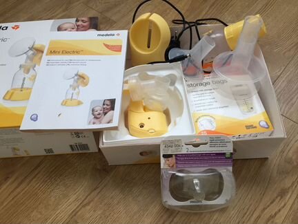 Молокоотсос Medela c пакетами для заморозки молока