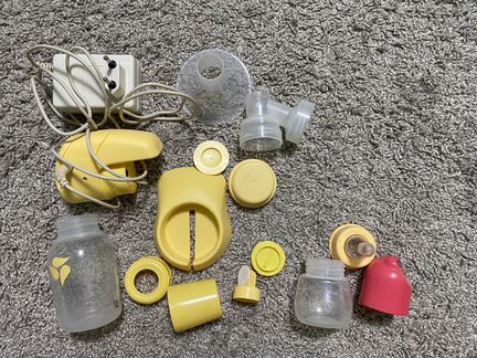 Молокоотсос medela электрический